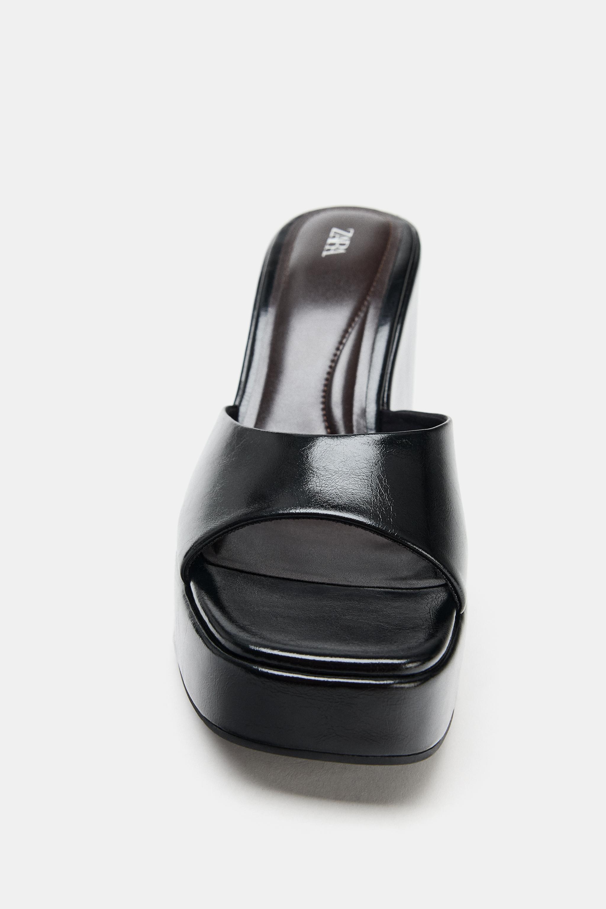 WEDGE HEELED SANDALS